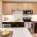a kitchen with wooden cabinets