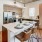 a kitchen with a dining table