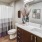 a bathroom with a sink toilet and a shower