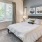a bedroom with a bed and a chair
